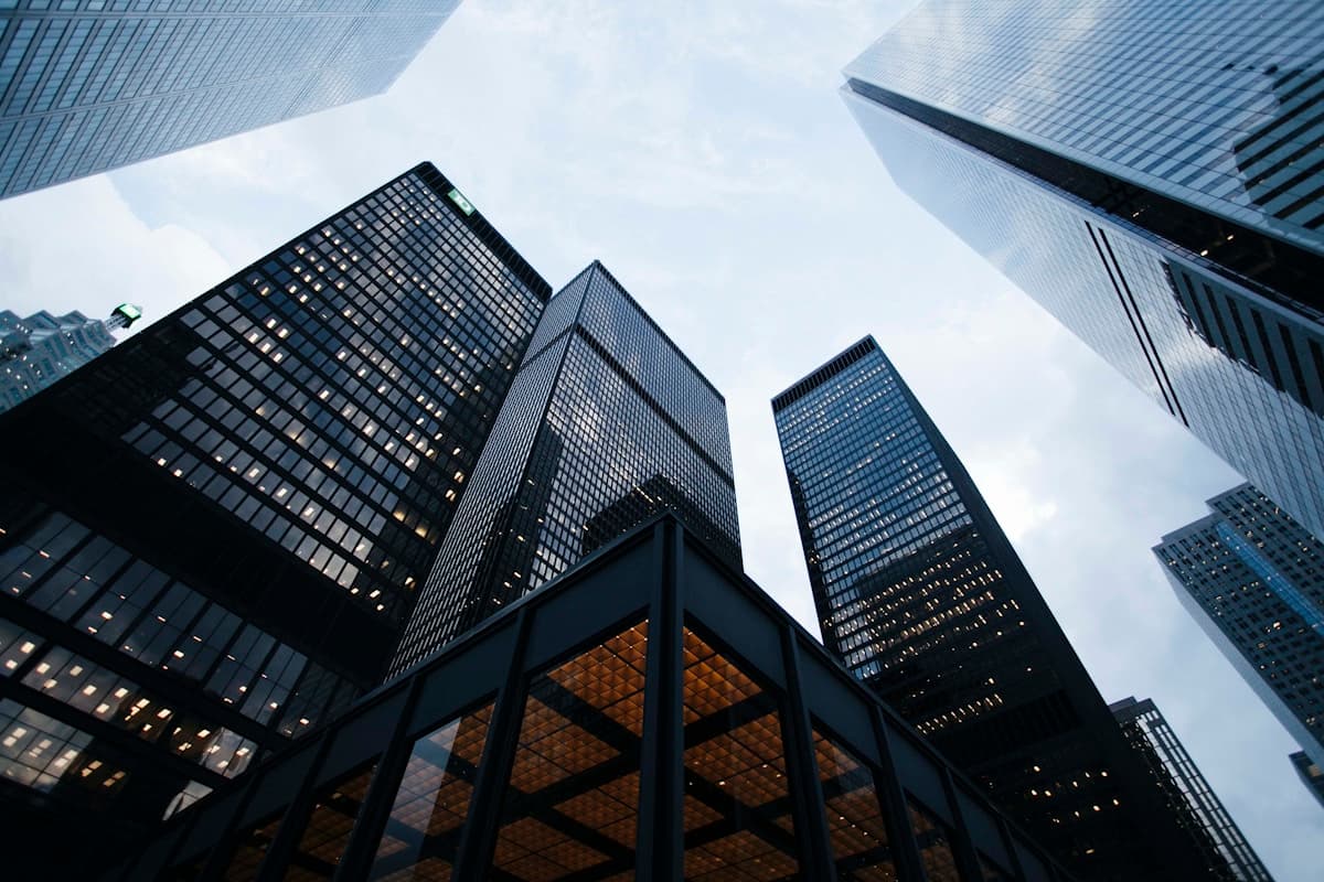 Glass-clad commercial high-rise towers in a central business district