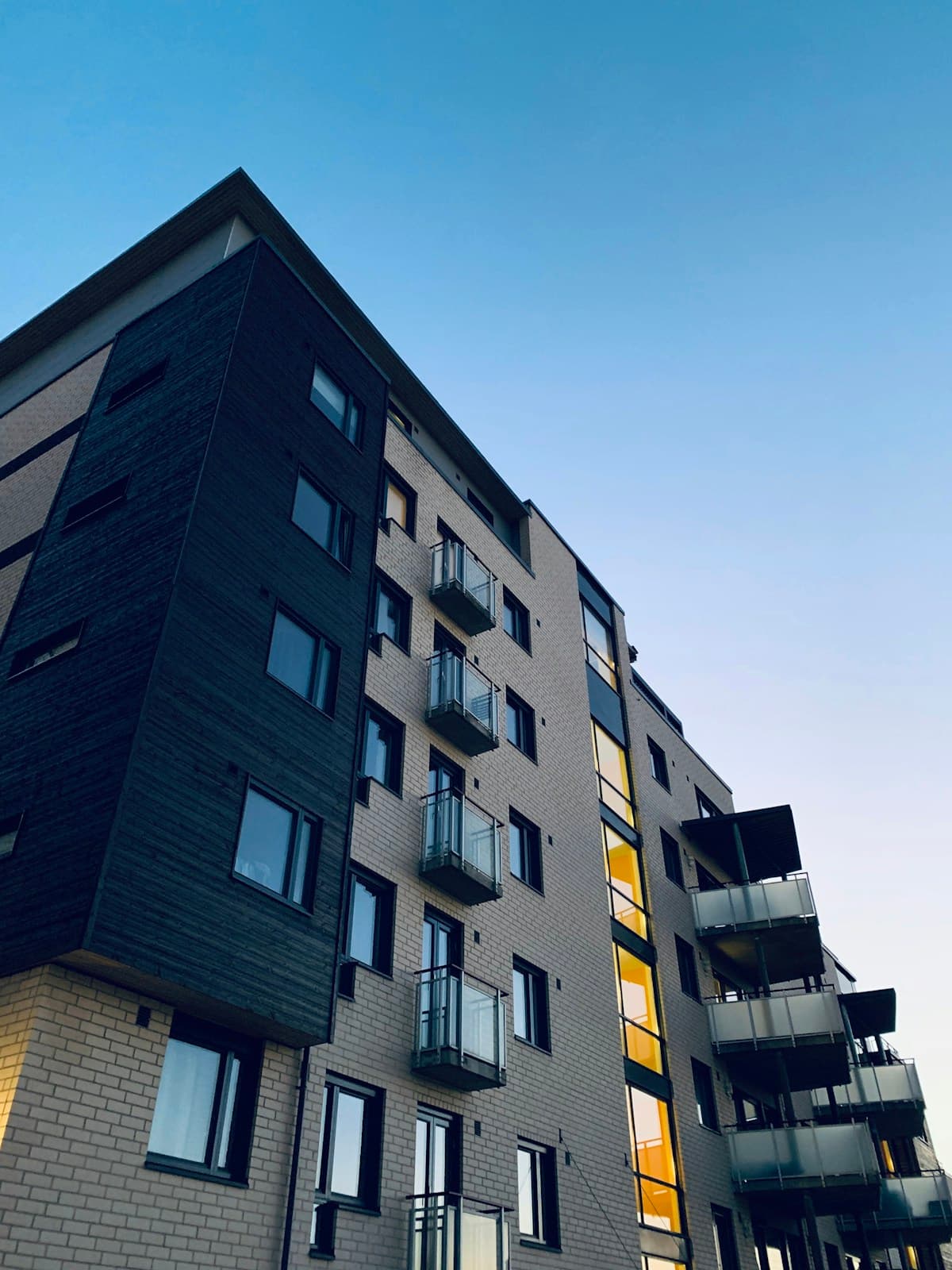 Contemporary mid-rise apartment building with private balconies